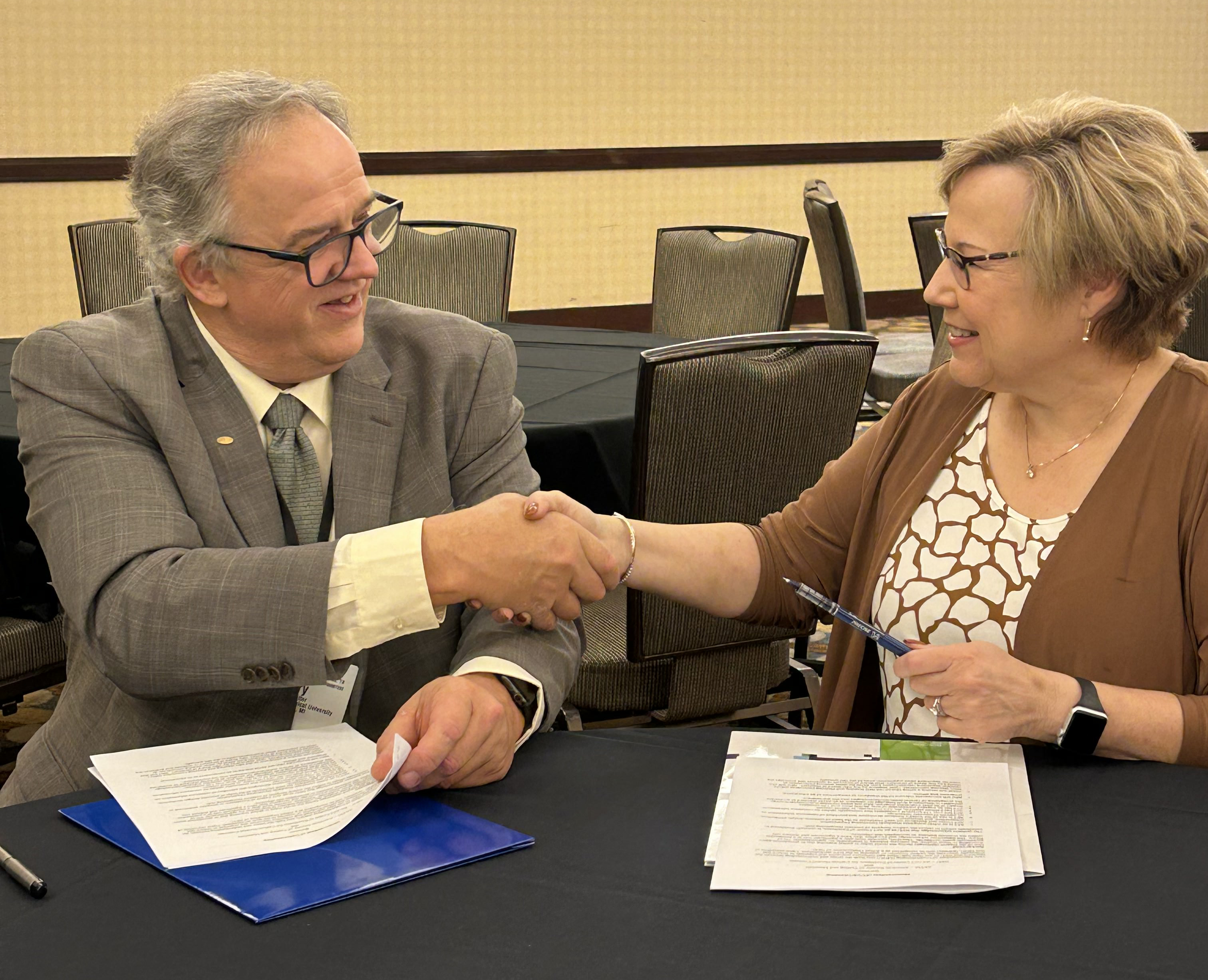 ASTM and NEU Sign MoU